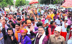 Festive fervour: Devotees take part in a shobha yatra in Sector 20, Chandigarh, on Saturday