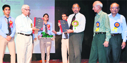 A souvenir being released recently during a seminar at the Quantum School of Technology in Roorkee. A Tribune photograph