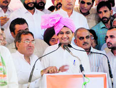 Deepender Hooda addresses a public meeting in Chautala village in Sirsa on Saturday. 