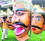 A worker prepares an effigy of Ravana ahead of Ram Leela celebrations in Guwahati on Saturday.  PTI