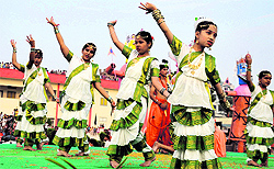 School students present a cultural item during Dasehra celebrations in Bathinda on Sunday