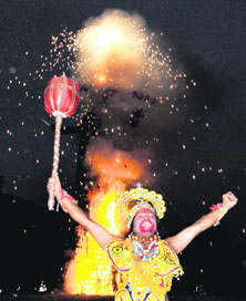 Hanuman exults as an effigy of Ravana goes up in flames at Sector 17 on Sunday.