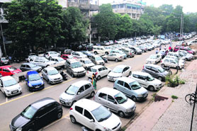 Vehicles parked haphazardly. 