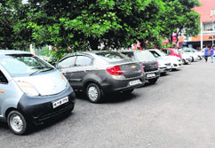 A paid parking lot sans lines to earmark space for each vehicle in Sector 8