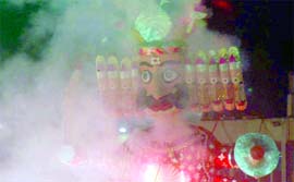 An effigy of the demon king Ravan being set alight at Ramlila Grounds in New Delhi on Sunday.