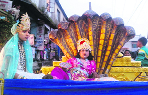 A tableau depicts Hindu myhtological gods and godessess during Dasehra festival procession in Mussoorie on Sunday.