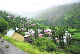 A view of the snowfall in higher peaks around Keylong. The Rohtang, Tanglang La and Bara Lacha on the Manali-Leh national highway experienced the first snowfall of the season on Saturday.