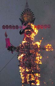An effigy of Ravana being burnt during Dasehra celebrations in Jammu on Sunday.
