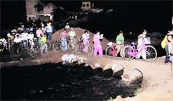 Commuters cross the temporary bridge at Jagatpura village in Mohali on Monday. Tribune photo: Vicky Gharu