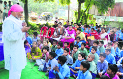 Dr Anil Joshi, an eminent environmentalist, addresses students at the energy fair organised by the WWF in Dehradun on Monday. A Tribune photograph