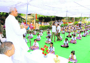 Dr Dev Vrat Acharya of Gurukul, Kuruksehtra, addresses a yoga and personality development workshop at Sugni Devi Arya Girls Senior Secondary School in Ladwa. 