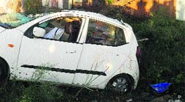 The mangled remains of the car which collided with a bus near Gurdaspur on Wednesday.