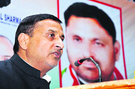 Sham Lal Sharma, Minister for PHE, Irrigation and Flood Control, addresses a lawyers meet in Jammu on Monday. 