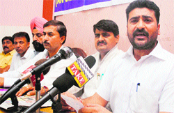 AJKPC general secretary Anil Sharma addresses a press conference in Jammu on Monday. Tribune photo: Inderjeet Singh