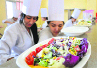 Girls participate in a competition organised by the Food Craft Institute in Jammu on Monday. Tribune Photo: Inderjeet Singh