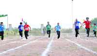 Students take part in the athletic meet. A Tribune photograph