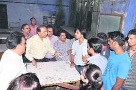 Students of DAV (PG) College gherao principal Dr Devender Bhasin in Dehradun on Tuesday