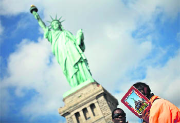 The Statue of Liberty was reopened to public after the state of New York agreed to shoulder the cost of running the site during the shutdown. 