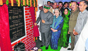 Chief Minister Virbhadra Singh lays the foundation stone of the Jabal Saroa drinking water scheme in Mandi on Tuesday. Mandi MP Pratibha Singh, IPH Minister Vidya Stokes and Health Minister Kaul Singh Thakur are also in the picture. 