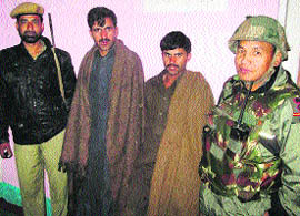 The two Pakistani militants who were held on Monday while infiltrating into the Valley. 