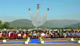 Sarang acrobatic team of the Indian Air Force displays its skills at the Air Force Station, Udhampur.