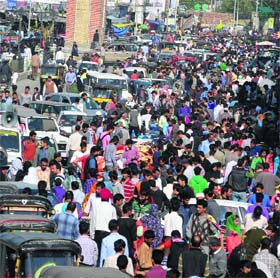 Heavy rush of people ahead of Eid-ul-Azha at Lal Chowk in Srinagar on Tuesday.