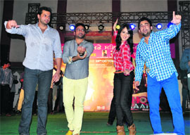Singer Sharry Mann and other members of the movie Ishq Garaari perform at Jaipalgarh in Bathinda on Wednesday