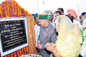Chief Minister Virbhadra Singh inaugurates the Hari Darshan bridge at Mandiarpur village in Nalagarh on Wednesday