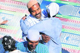 Muslims hug after Eid-ul-Adha prayers in Shimla on Wednesday