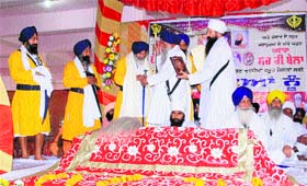 Sikh preachers being felicitated at a function to spread the message of peace and brotherhood, in Jammu on Wednesday