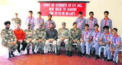 Students of KV School, New Delhi, with MLA Abdul Gani Malik and Commanding Officer, Rashtriya Rifles Battalion, at Sarh in Reasi. A Tribune photograph 