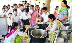 Mid-day meal being served to students at a government school in Ludhiana.