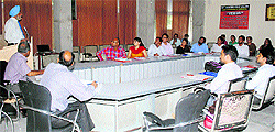 The Kurukshetra University Vice-Chancellor, Lt Gen DDS Sandhu (retd), addresses one of the batches of the three-week induction programme for 274 contract teachers, organised by KU Academic Staff College on its premises