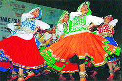Students of the DAV Girls' College, Yamunanagar, perform during the International Woman Folk Dance Competition at Shimla