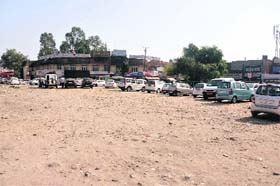 This piece of land has been suggested as a possible site for the proposed multi-level parking lot