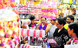 Women shop for Karva Chauth at Patel Bazaar in Jammu on Thursday