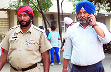 Deputy Director, Animal Husbandry, Jaspal Singh Ghuman being taken away by the police after being produced in a court in Jalandhar on Thursday