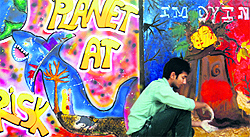 A student paints graffiti during a competition at BCM School in Ludhiana