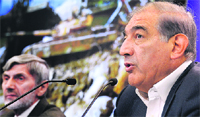 Syrian Deputy PM Qadri Jamil (R) at a press conference in Moscow on Thursday.  AFP