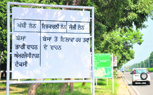 The UT Administration has started installing signboards in Hindi and Punjabi alongside roads in Chandigarh. Motorists have been advised to stick to lane driving. UT Administrator Shivraj V Patil had asked the UT officials to install signboards in Hindi and Punjabi as well. The police had recently caught hold of a person who spilt black paint over signboards. He told the police that he wanted the Administration to promote Punjabi. Tribune photo: S Chandan