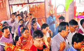 Devotees queue up to offer prayers at the Mata Chandi Devi shrine in Haridwar on Friday