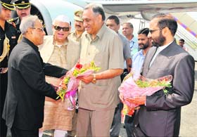 President Pranab Mukherjee being received by Governor Aziz Qureshi and Chief Minister Vijay Bahuguna at the Jolly Grant Airport on Friday