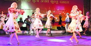 A cultural troupe from Spain and Russia perform on a cultural night of Kullu Dasehra on Friday.