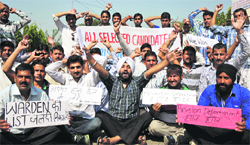 Youth stage a protest against delay in appointments in Jammu on Friday. tribune photo: inderjeet singh