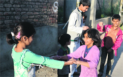 Children make merry on the third day of Eid-ul-Azha in Srinagar on Friday. Photo: Yawar Kabli