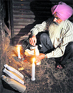 A health department official collects samples of edible oils during a raid at a factory on Gokul Road near Bute Shah Mandi in Ludhiana