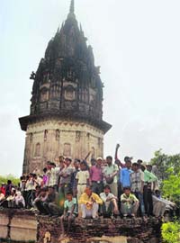 People gather at the fort of Raja Rao Ram Bux Singh in Unnao on Friday