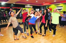 Twinkle toes: Jasmeet Shan (in blue T-shirt) with her students during a dance class