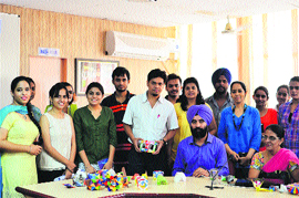 Architecture students at the workshop held at Giani Zail Singh Punjab Technical University campus to hone their creative skills through paper folding techniques.