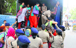 Anganbari workers protesting in support of their demands arrested in Dehradun on Saturday.